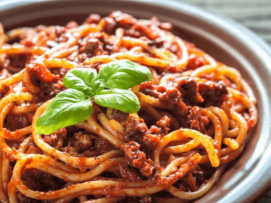 Jakie warzywa do spaghetti? Odkryj sekrety pysznego sosu bolognese